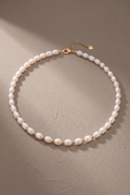 DropIQ white rice pearl strand necklace with gold spacer beads