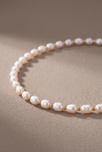 Close-up of the rice pearls and gold spacer beads